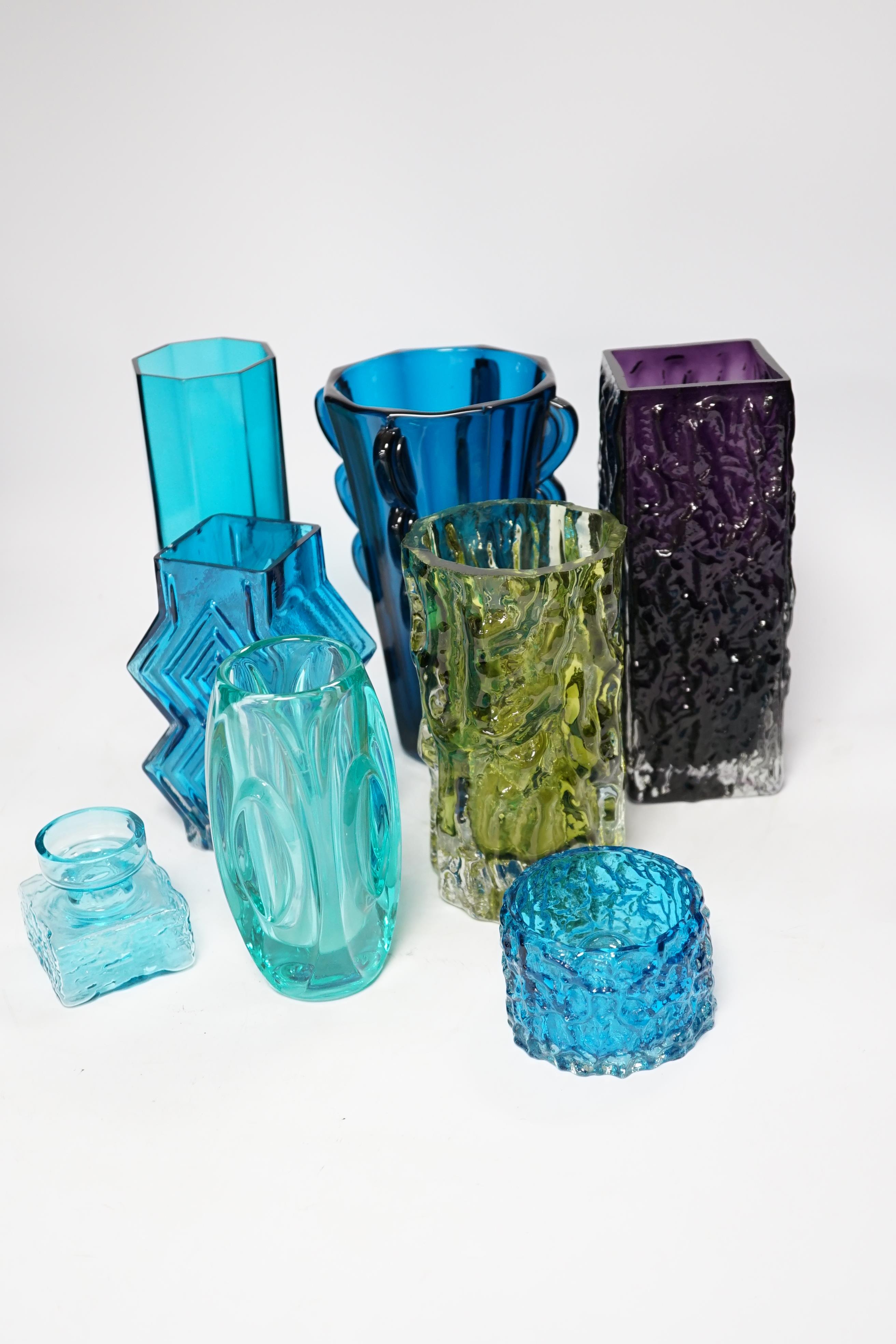 Eight coloured glass vases, including Whitefriars mobile phone vase in kingfisher blue, 22cm high